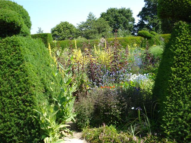 Are the defined spaces of garden rooms, seen here at Great Dixter, to become mandatory in good New Zealand gardens?