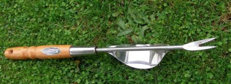 A handy implement for dealing to lawn weeds