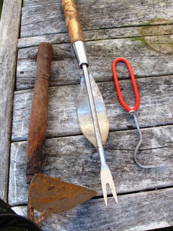 The rusted Niwashi, implement for flat weeds and aptly branded Wonder Weeder