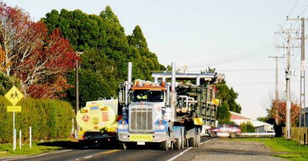 Trucks on raod by Tikorangi school