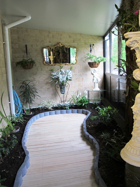 Ann and Maurice were keeping their intensively gardened areas close to the house - very close for these areas under cover 