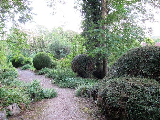 In an otherwise undistinguished garden in Giverny village, these clipped hummocks gave real impact. 