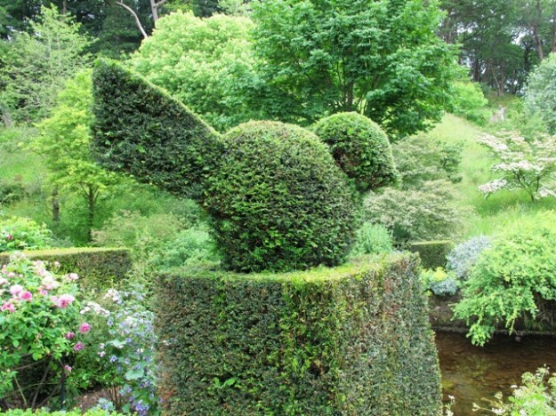While the topiary bird At Gresgarth may be beyond the amateur, the sharp lines give contrast to the informal plantings and design. 