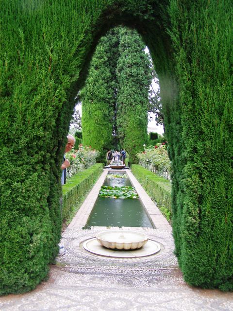 The gardens at the Alhambra are re-creations. Note the gentlemen on the left, politely trying not to intrude on my photo. 