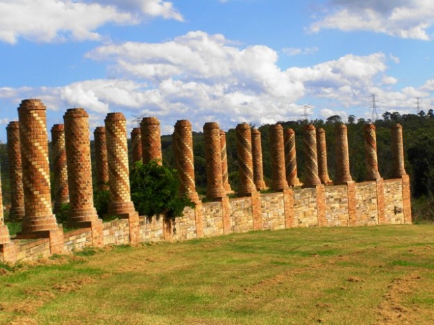 These are only half the columns at Paradise. The other half of the crescent is already wreathed in plants as a completed section of colonnade. 