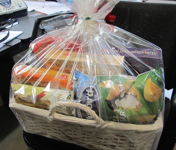 Some may be grateful for a hamper containing Bluebird salt and vinegar chips and housebrand Pam's  Christmas mincemeat tarts 