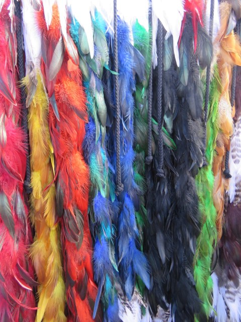 Colourful korowai - traditional Maori cloaks - made with dyed feathers